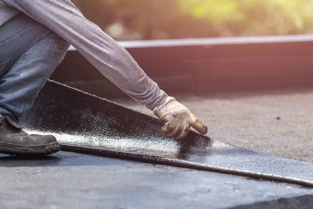 Professional Emergency Waterproofing technician working in Riga, MI
